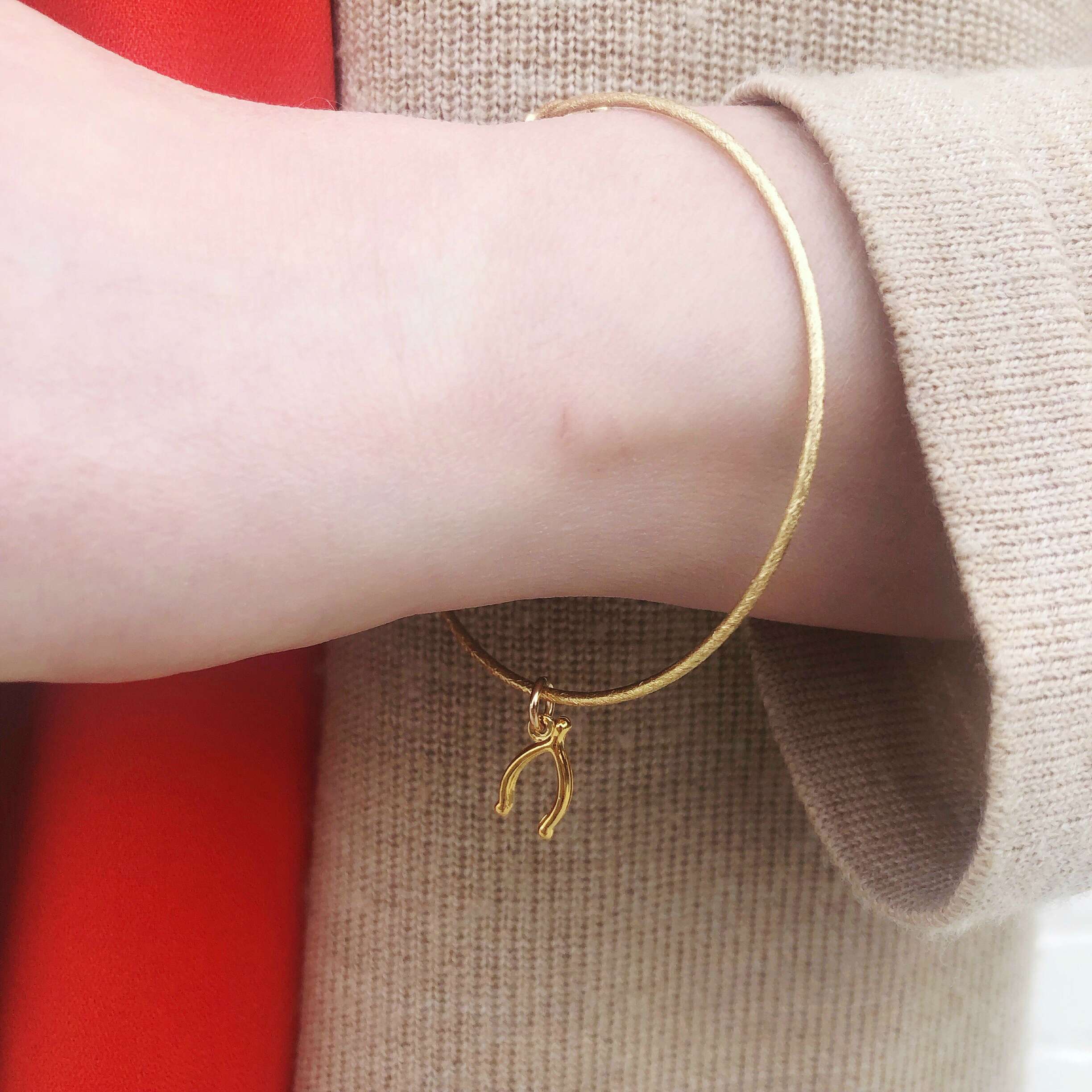 Moon and Lola - Wishbone Charm on a sleek Nora Bangle Bracelet