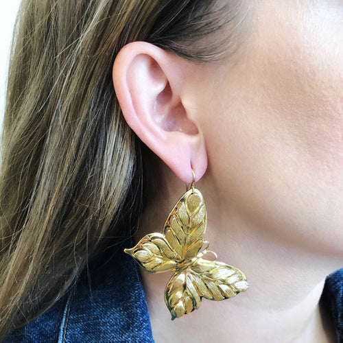 Moon and Lola - Butterfly Earrings in gold on model