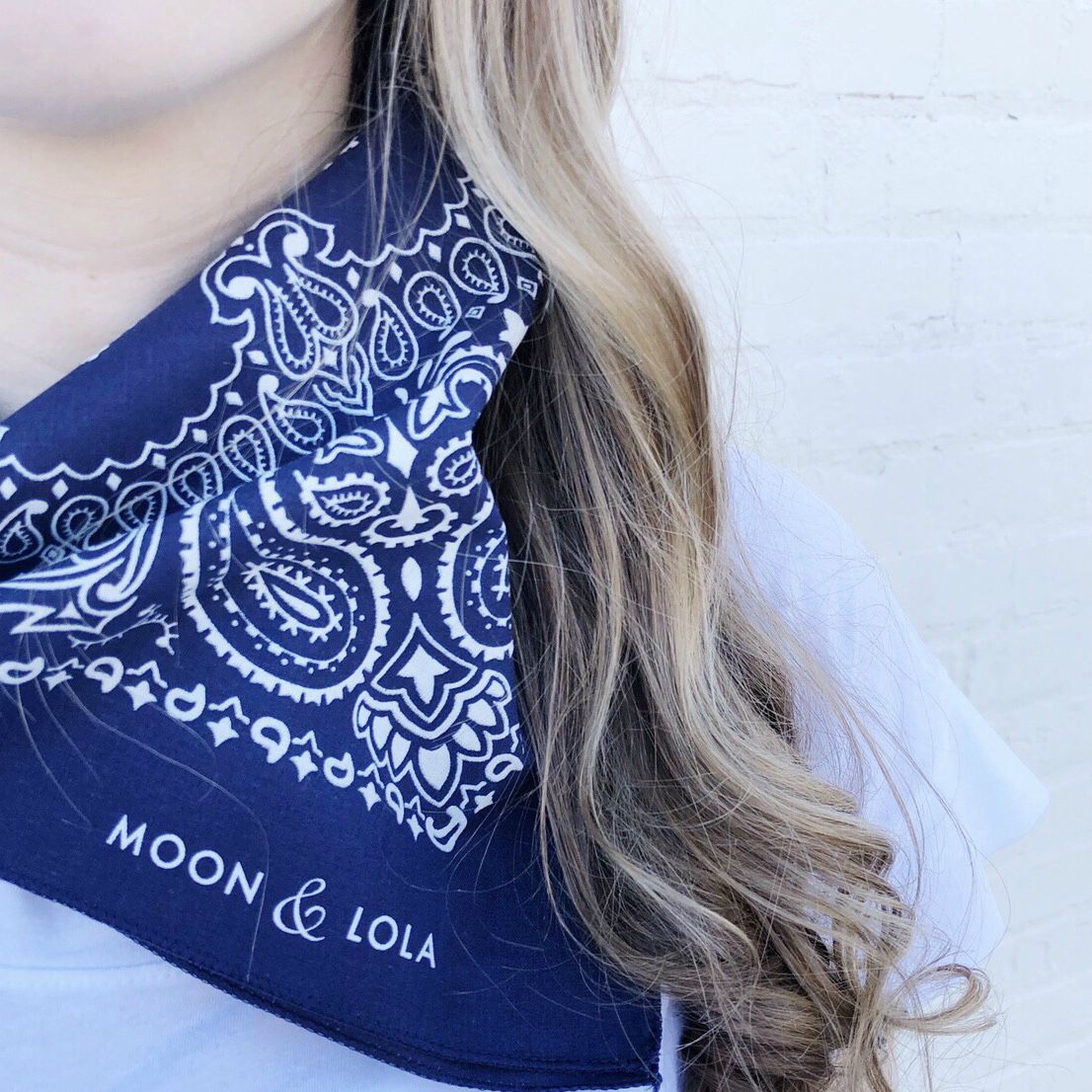Moon and Lola - Traditional Bandana in Navy tied around neck as a kerchief