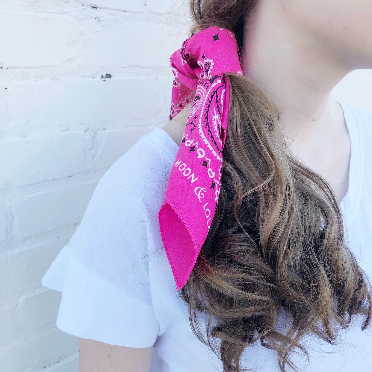 Moon and Lola - Traditional Bandana in Hot Pink on a side ponytail
