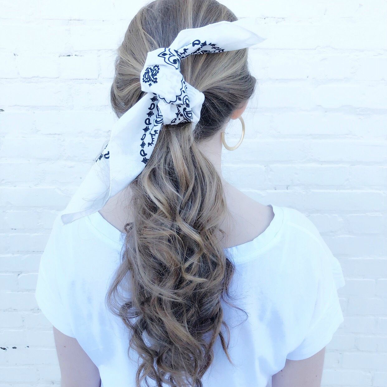 Moon and Lola - Traditional Bandana in White tied to low ponytail