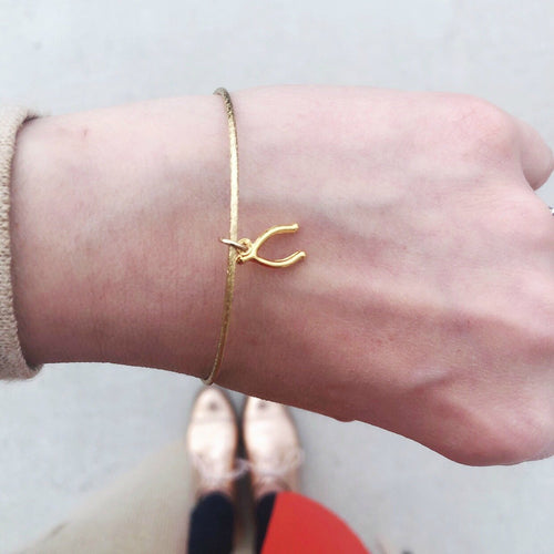 Moon and Lola - Wishbone Charm on a sleek Nora Bangle Bracelet