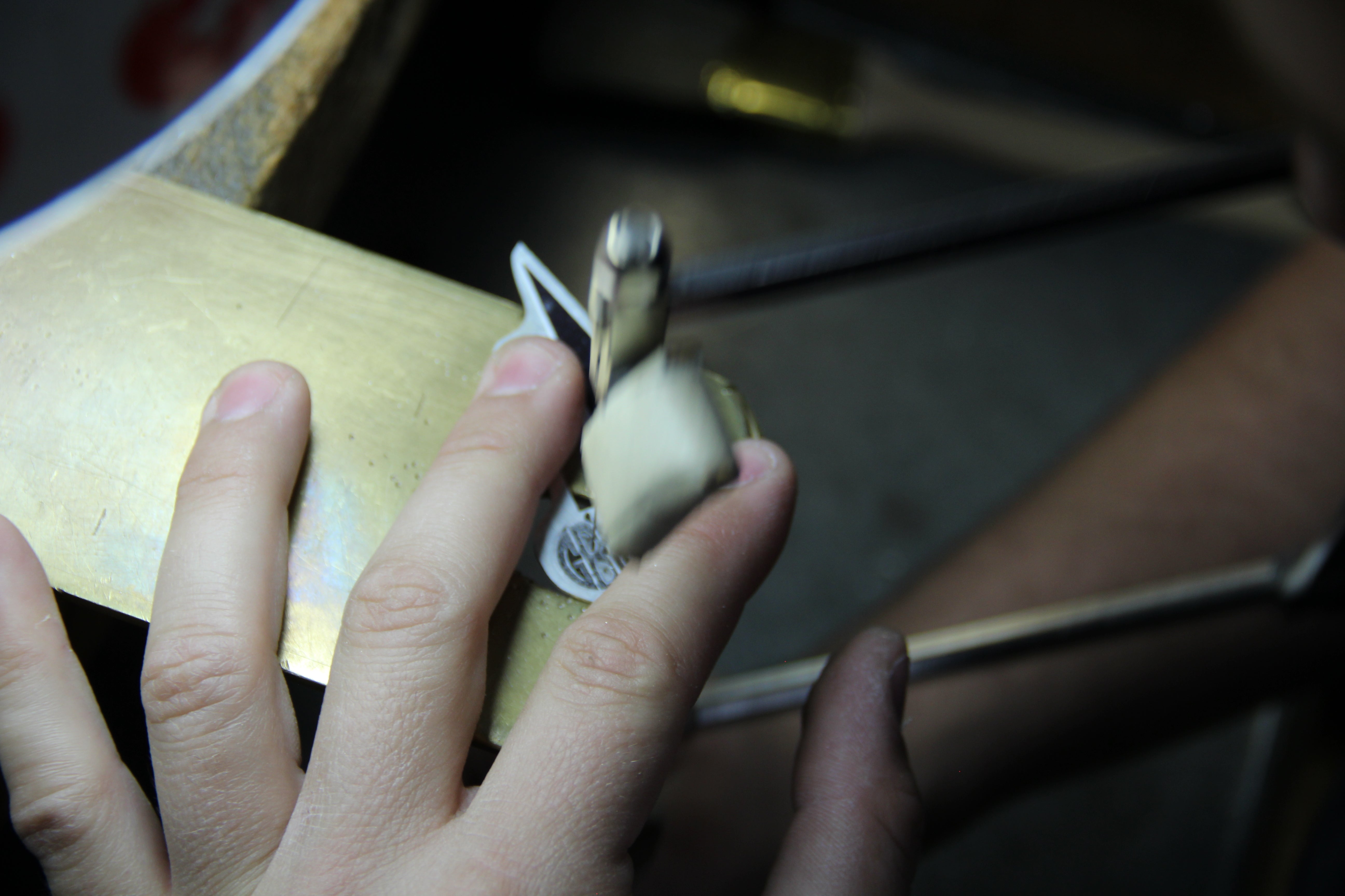 Moon and Lola production of hand-drawn hand-cut fine metals