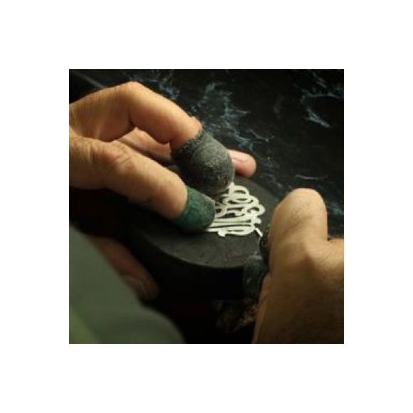 Moon and Lola production of hand-drawn hand-cut fine metals